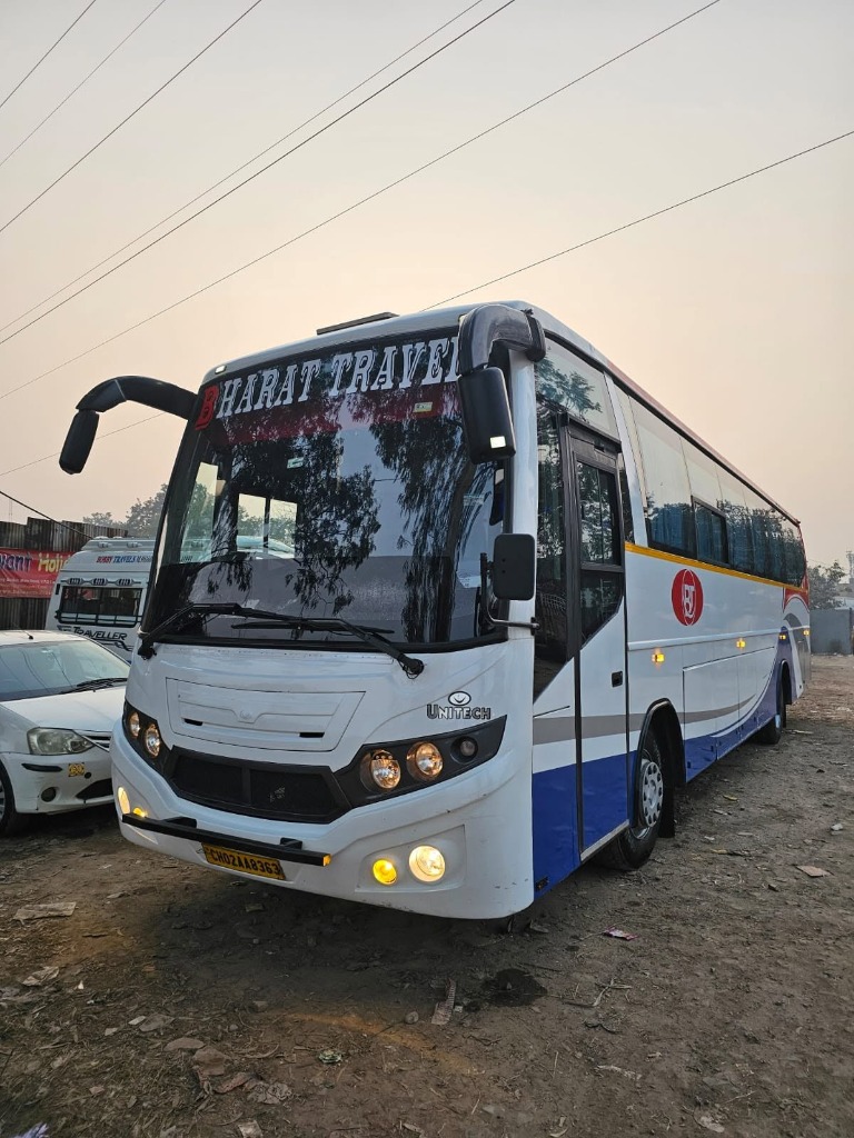 Bharat Travels White and Blue Deluxe Tourist Coach - CH02AA8363